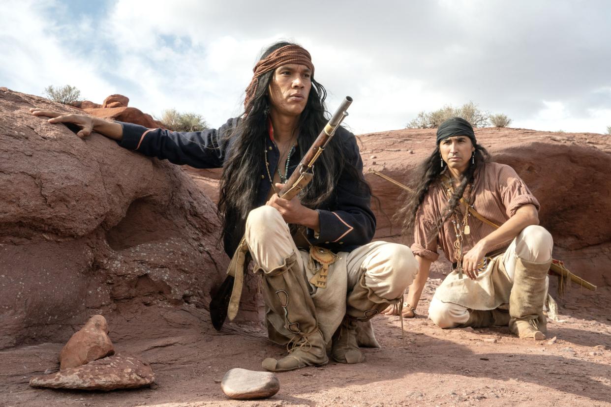 Owen Crow Shoe, left, and Tatanka Means star as Apache warriors who discover settlers on their land in 