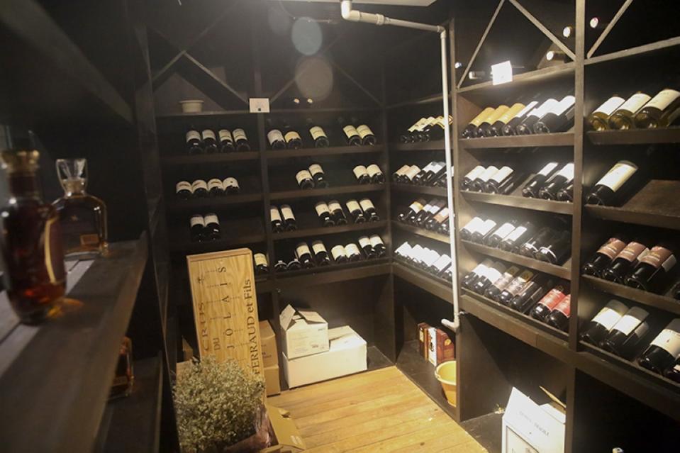 The extensive wine collection is curated by Chew.