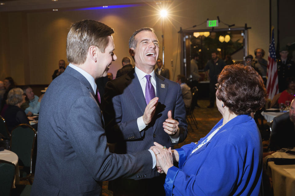 Garcetti meets with Democrats during the Scott County Democrats Red, White and Blue Gala in Davenport, Iowa, on April 14. Garcetti was joined by California Rep. Eric Swalwell, a native Iowan who may also be considering a 2020 presidential bid. (Photo: KC McGinnis for Yahoo News)