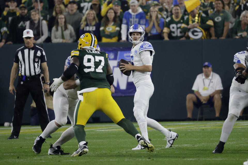 Detroit Lions quarterback Jared Goff (16) looks to pass during the first half of an NFL football game against the Green Bay Packers, Thursday, Sept. 28, 2023, in Green Bay, Wis. (AP Photo/Mike Roemer)