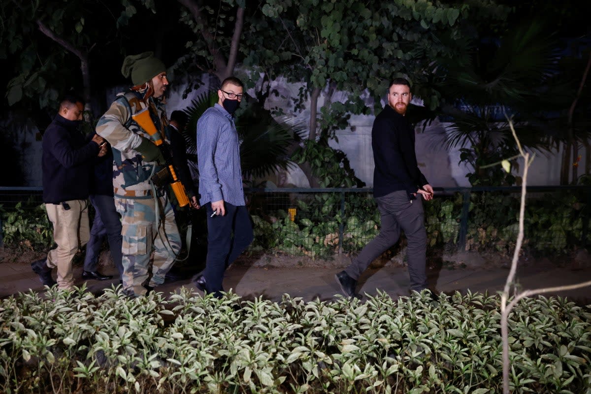 Israel embassy officials and members of the security forces check the area, following a reported explosion nearby, in New Delhi, India (REUTERS)