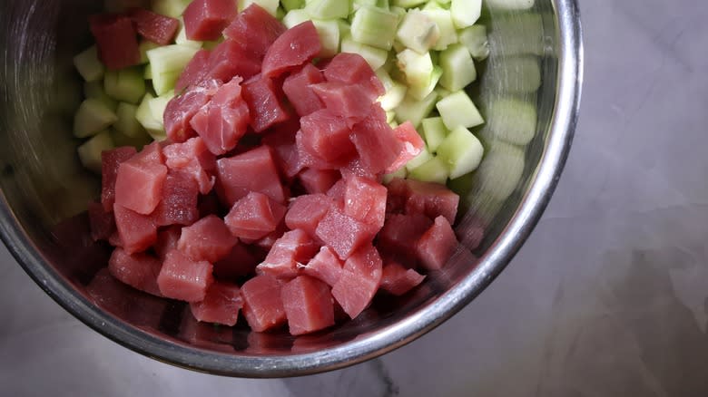 bowl of tuna, cucumber, and jicama cubes