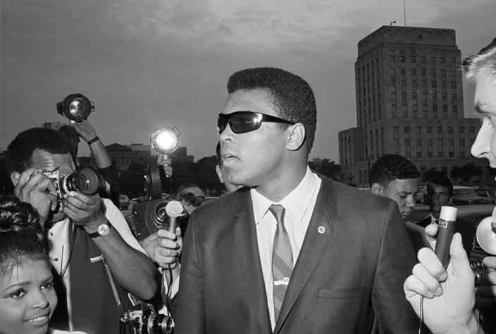 Muhammad Ali in 1967 at the Federal Building in Houston, where a federal judge told him to refile his plea to avoid the draft after his scheduled induction. (Photo: Fred Kaufman/AP)