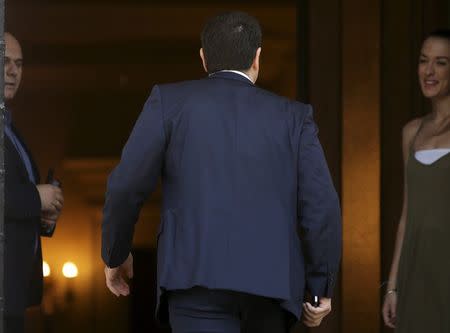 Greek Prime Minister Alexis Tsipras returns at the Maximos Mansion after a meeting with the Defense minister in Athens, Greece, July 2, 2015. REUTERS/Christian Hartmann