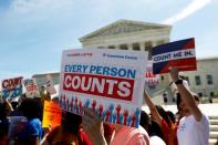 FILE PHOTO: Demonstrators gather outside the U.S. Supreme Courthouse in Washington