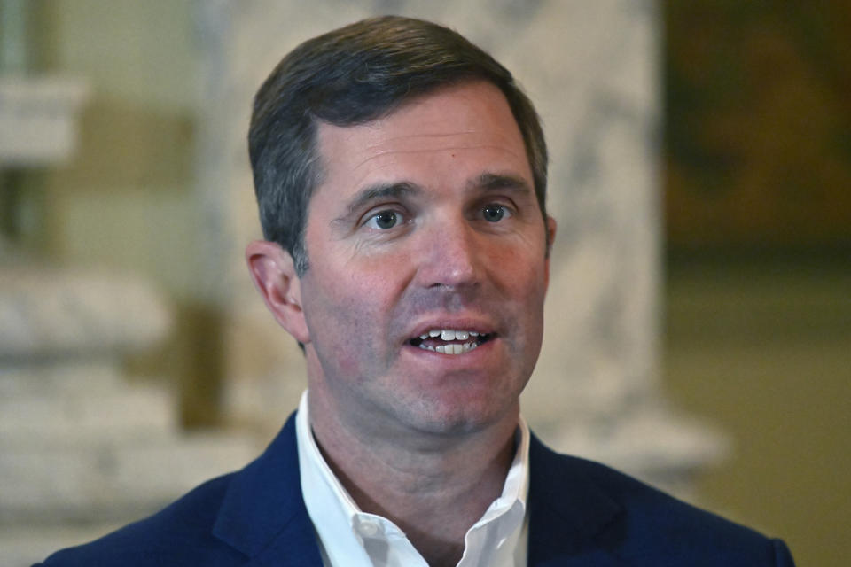 Kentucky Governor Andy Beshear answers questions during an interview at the Kentucky State Capitol in Frankfort, Ky., Wednesday, Dec. 7, 2022. (AP Photo/Timothy D. Easley)