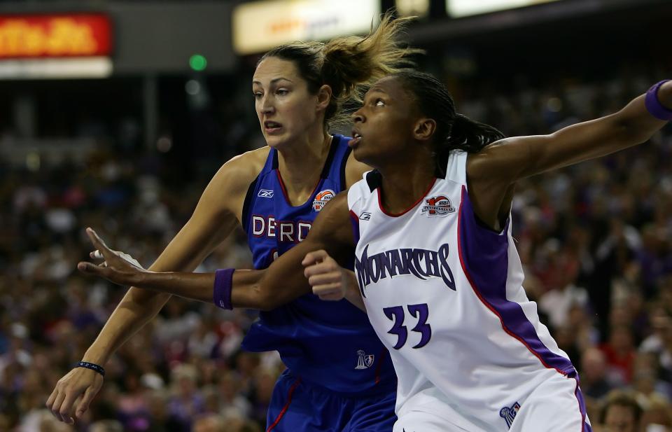 Sacramento's Yolanda Griffith fights for rebound position against the Detroit Shock's Ruth Riley during the 2006 WNBA Finals. Griffith led the Monarchs to two striaght WNBA FInals and won one championship with the franchise. (Jed Jacobsohn/Getty Images)