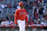 Los Angeles Angels manager Ron Washington walks out to the mound to remove a pitcher during the ninth inning of a baseball game against the Boston Red Sox in Anaheim, Calif., Sunday, April 7, 2024. (AP Photo/Alex Gallardo)