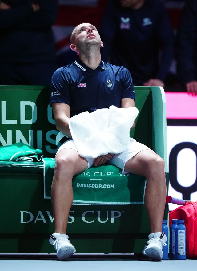 Great Britain’s Dan Evans sits with a towel in his lap and looks up at the sky during the Davis Cup group stage finals match at the AO Arena, Manchester. 