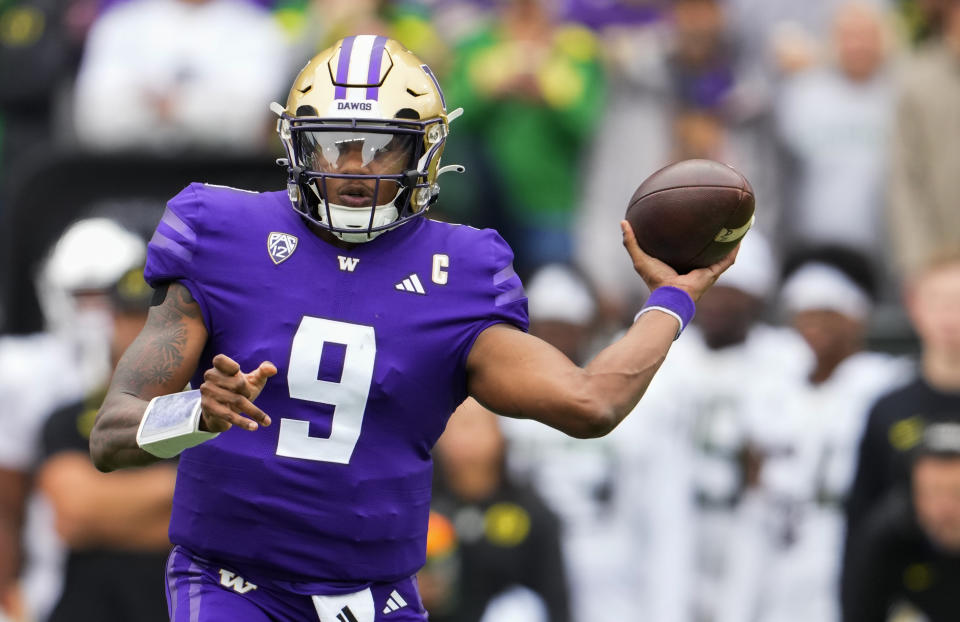Washington quarterback Michael Penix Jr. throws against Oregon during the first half of an NCAA college football game, Saturday, Oct. 14, 2023, in Seattle. (AP Photo/Lindsey Wasson)