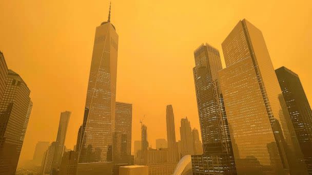 PHOTO: Traffic moves along West Street past One World Trade Center, June 7, 2023, in New York, amidst smokey haze from wildfires in Canada. (Andy Bao/AP)