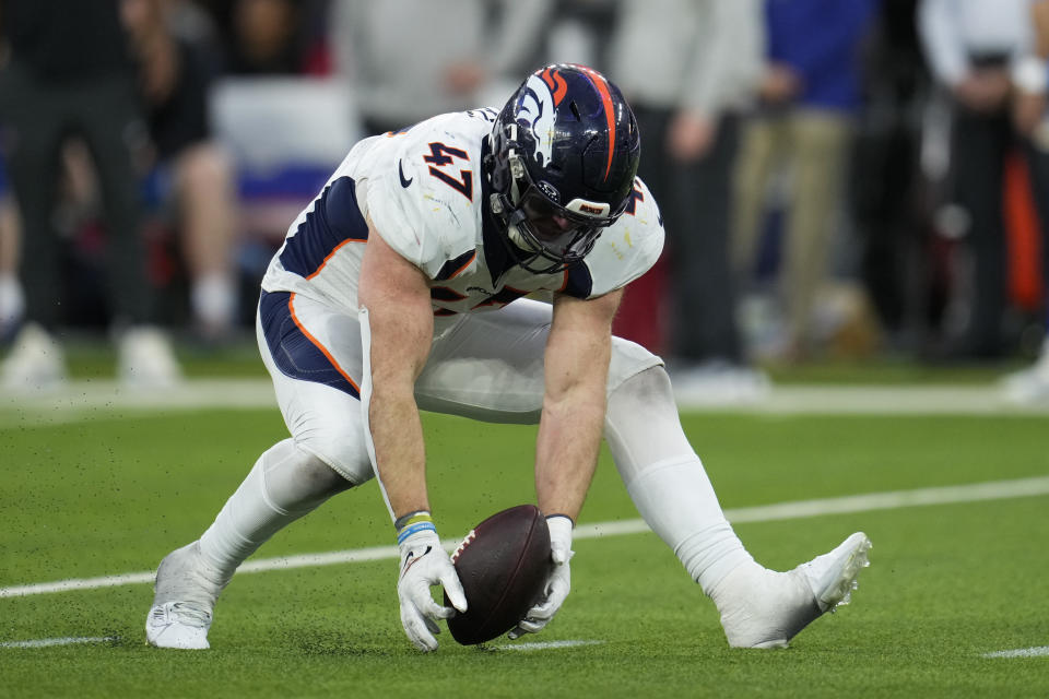 Denver Broncos linebacker Josey Jewell (47) recovers a fumble during the second half of an NFL football game against the Los Angeles Chargers Sunday, Dec. 10, 2023, in Inglewood, Calif. (AP Photo/Marcio Jose Sanchez)