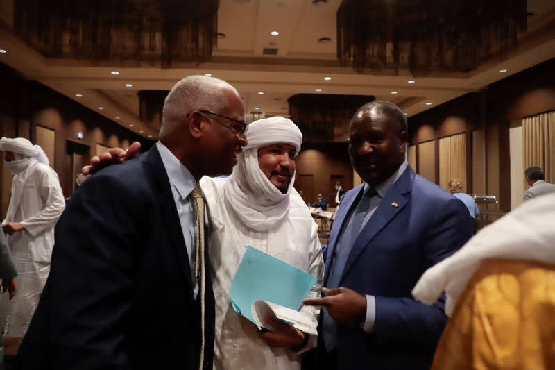 Attaye Ag Mohamed, Representative of the Coordination of Azawad Movements (CMA) talks with El-Gassim Wane, Special Representative of the United Nations Secretary General in Mali and Head of Minusma and Abdou Abarry, representative of Niger in United Nation