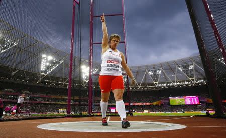 Athletics - World Athletics Championships - Women's Hammer Throw Final – London Stadium, London, Britain - August 7, 2017. Anita Włodarczyk of Poland reacts on her way to winning gold. REUTERS/Kai Pfaffenbach