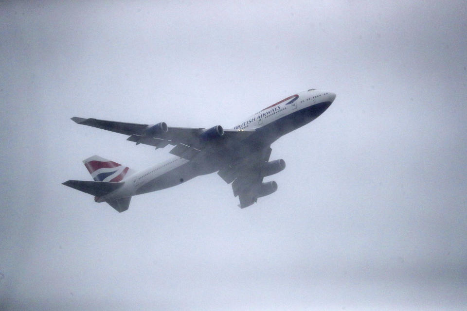 CAPTION OMITS INFO ON DUAL TAKE OFF Aircraft G-CIVY, one of the last two British Airways Boeing 747-400 aircraft takes off for its last flight departure from London's Heathrow Airport, Thursday, Oct. 8, 2020. The retirement of the fleet was brought forward as a result of the impact the Covid-19 pandemic had on the airline and the aviation sector. (Andrew Matthews/PA via AP)