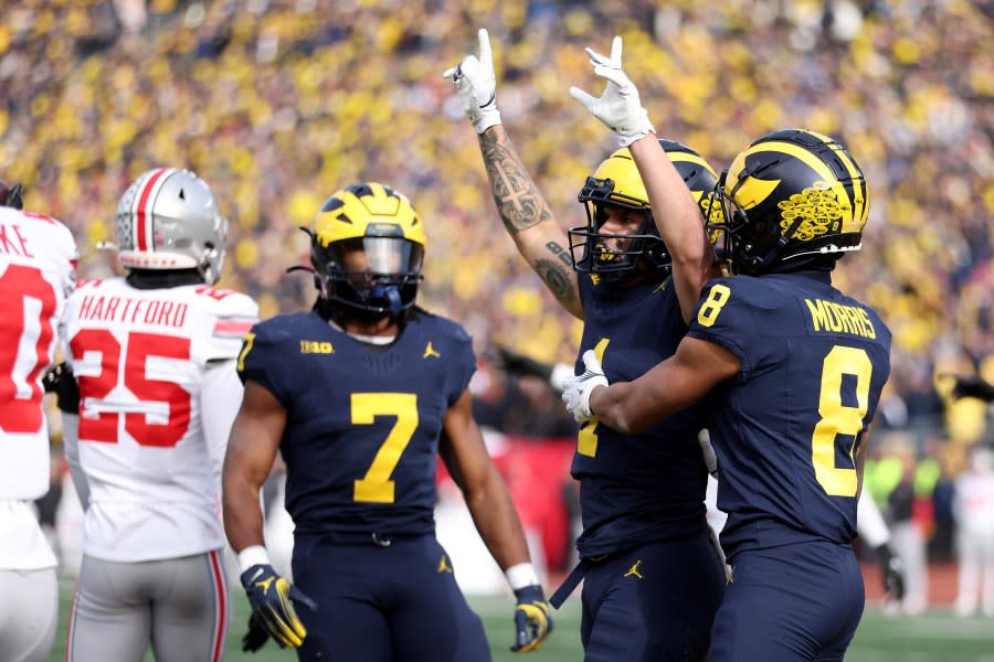 ANN ARBOR, MICHIGAN – NOVEMBER 25: Roman Wilson #1 of the Michigan Wolverines celebrates after scoring a touchdown against the Ohio State Buckeyes during the second quarter in the game at Michigan Stadium on November 25, 2023 in Ann Arbor, Michigan. (Photo by Gregory Shamus/Getty Images)