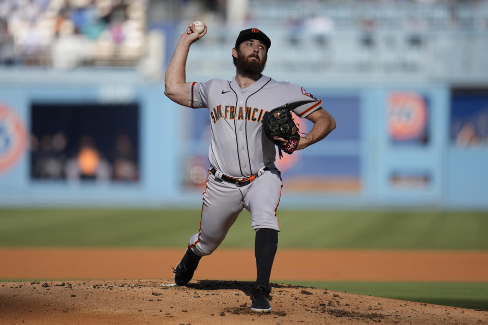 San Francisco Giants starting pitcher Ryan Walker (74) throws during the first inning of a baseball game against the Los Angeles Dodgers in Los Angeles, Sunday, Sept. 24, 2023. (AP Photo/Ashley Landis)
