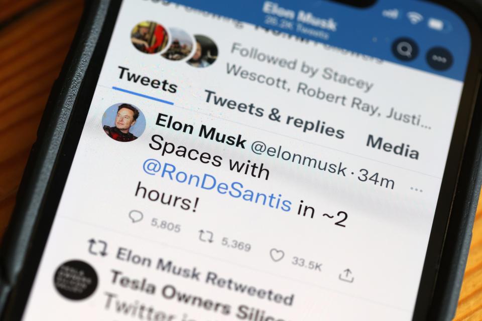 In this photo illustration, businessman and Twitter owner Elon Musk tweets about a Twitter Spaces event he will be hosting with Florida Governor Ron DeSantis on May 24, 2023, in Chicago, Illinois.