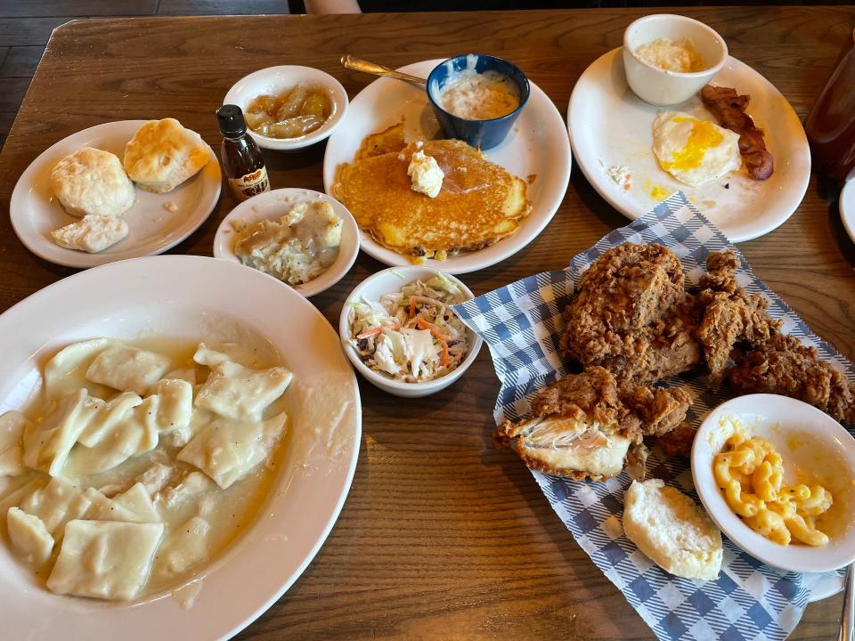 Partially eaten chicken, mac and cheese, eggs, chicken and dumplings, biscuits, and pancakes at Cracker Barrel