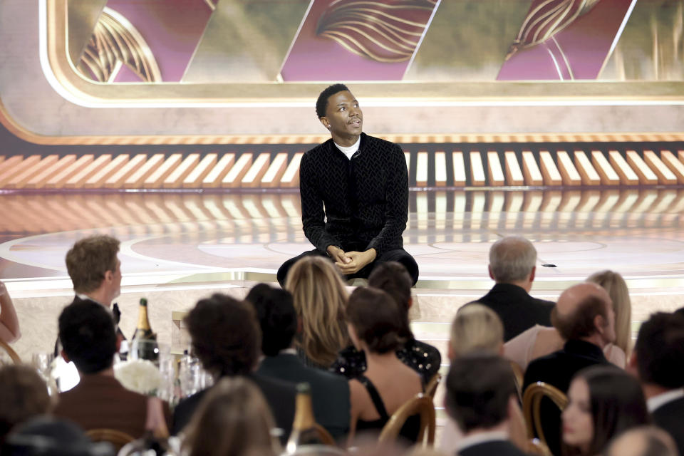 This image released by NBC shows host Jerrod Carmichael during his monologue at the 80th Annual Golden Globe Awards held at the Beverly Hilton Hotel on Tuesday, Jan. 10, 2023, in Beverly Hills, Calif. (Rich Polk/NBC via AP)