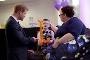 Harry meets Finley Green, 7, the winner of the Inspirational Child Award ages 4-6.