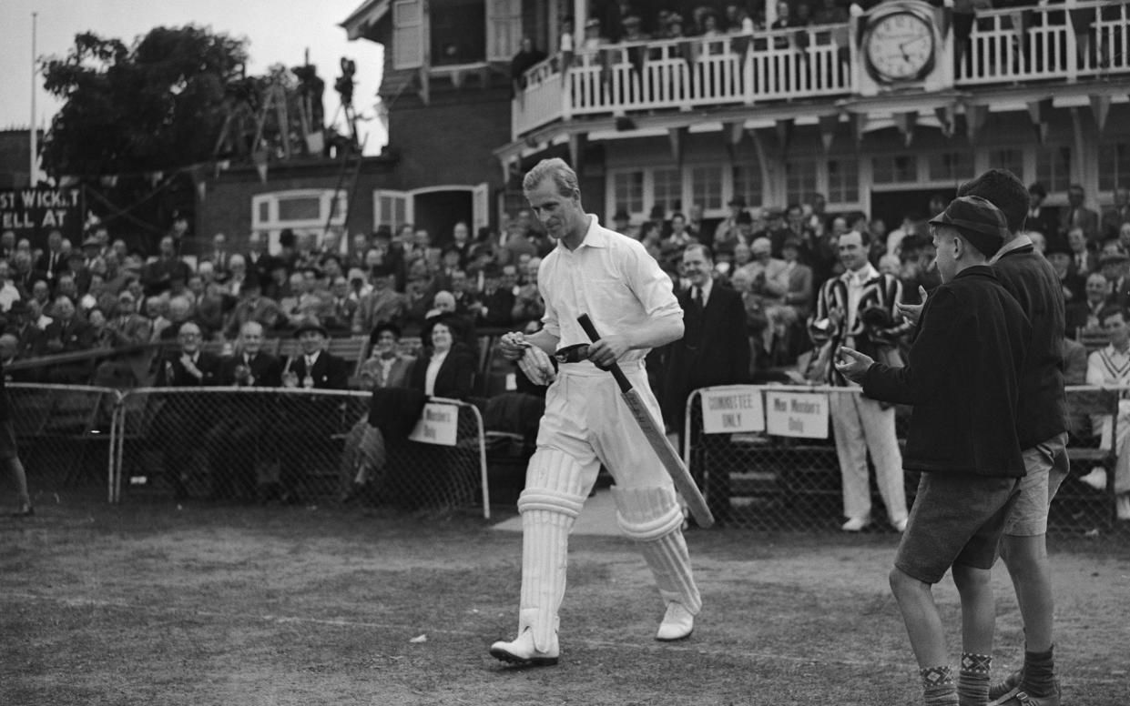 The Duke of Edinburgh playing in a game of cricket id aid of the Playing Field Association in 1949, the after he became its president