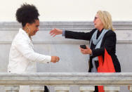 <p>Bill Cosby accusers Lili Bernard, left, and Victoria Valentino, right, reach out to embrace outside the courtroom after Cosby was found guilty in his sexual assault retrial, Thursday, April, 26, 2018, at the Montgomery County Courthouse in Norristown, Pa. (Photo: Mark Makela/Pool Photo via AP) </p>