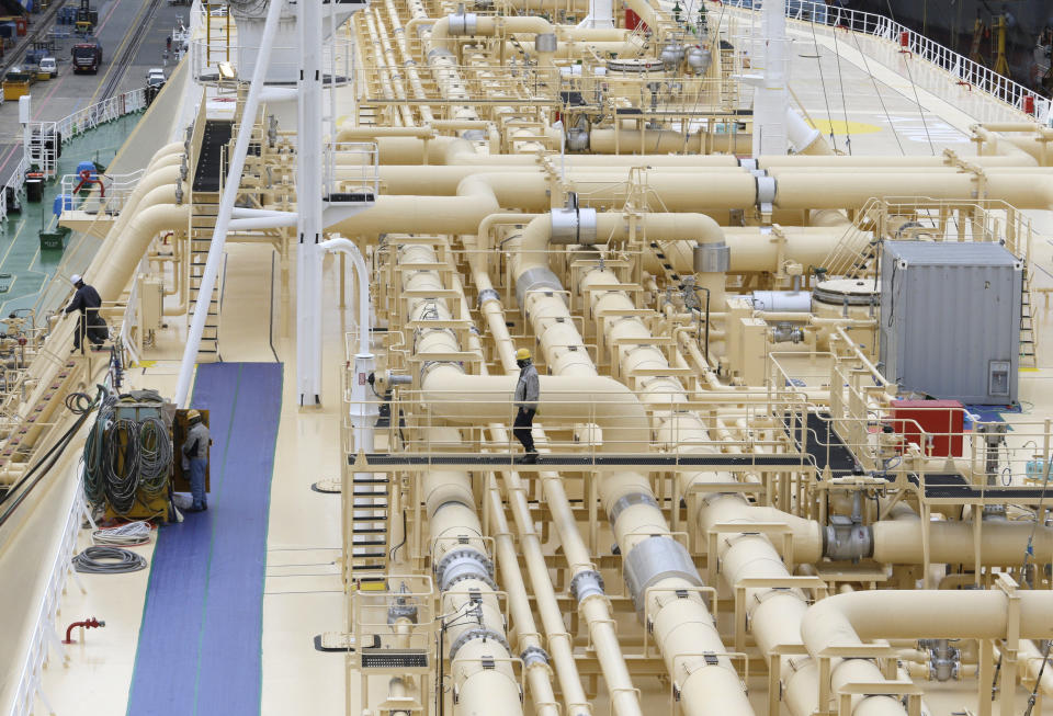 In this Friday, Dec. 7, 2018 photo, large-sized liquefied natural gas (LNG) carriers are being constructed at the Daewoo Shipbuilding and Marine Engineering facility in Geoje Island, South Korea. This is South Korea’s largest shipyard. (AP Photo/Ahn Young-joon)