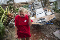 <p>Emily Zurawski cries while inspecting her home in Port Aransas, Texas, on Sunday, Aug. 27, 2017. (Photo: Nick Wagner/Austin American-Statesman via AP) </p>