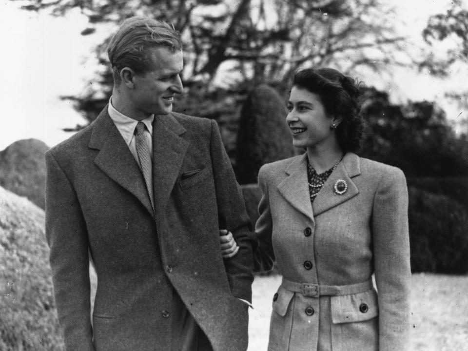 A black and white photo of Queen Elizabeth II and Prince Philip on their honeymoon in 1947.