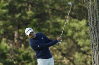 Collin Morikawa hits toward the 10th fairway at Spyglass Hill Golf Course during the second round of the AT&T Pebble Beach National Pro-Am golf tournament in Pebble Beach, Calif., Friday, Feb. 2, 2024. (AP Photo/Eric Risberg)