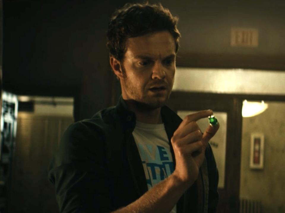 Hughie holding a vial of temporary compound V in the season three finale of "The Boys."