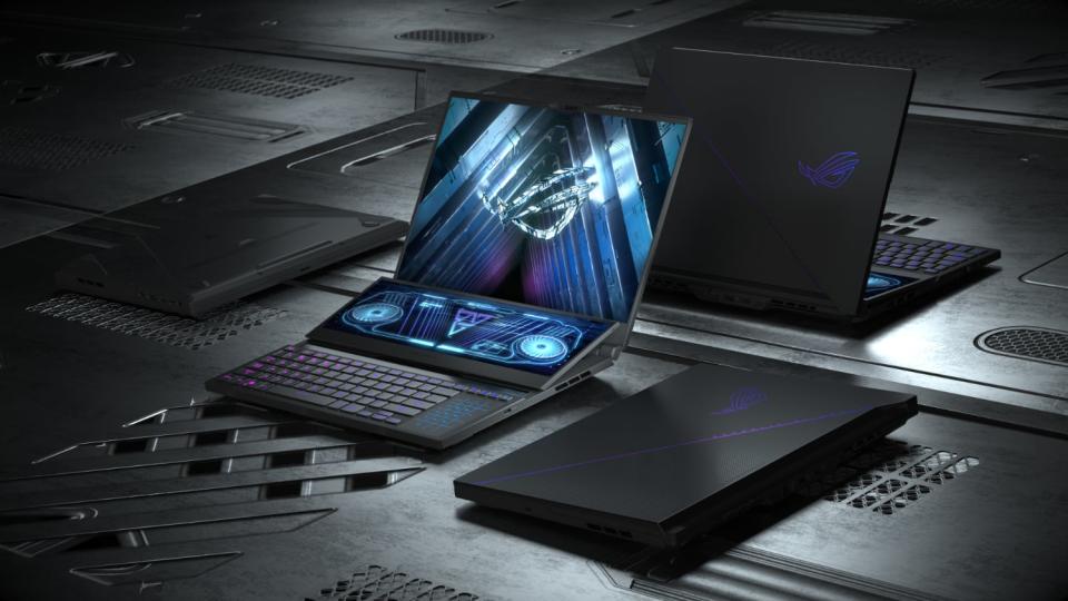 PR photo of the ASUS Duo 16 laptop on a table in a dramatic setting