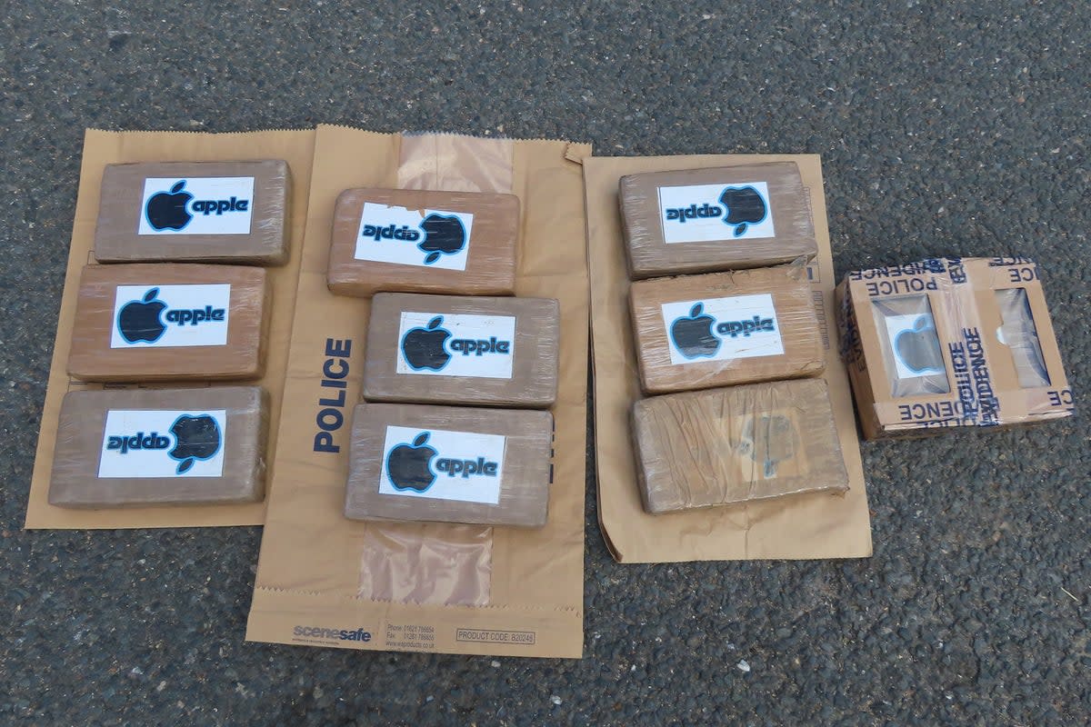 Officers discovered 10 large blocks of cocaine with an apple logo printed on the packaging in the bag  (Met Police)