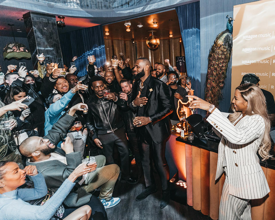 Savanna James toasts her husband LeBron James at a celebration thrown by Lobos 1707 Tequila & Mezcal and sponsored by Amazon Music Rotation at the Fleur Room in Los Angeles on Feb. 7, 2023.