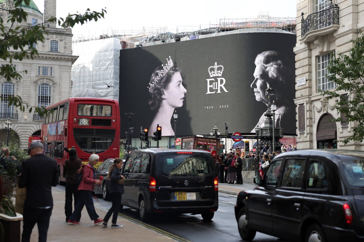 A capital in mourning: billboards across town are paying tribute to the Queen  (Getty Images)