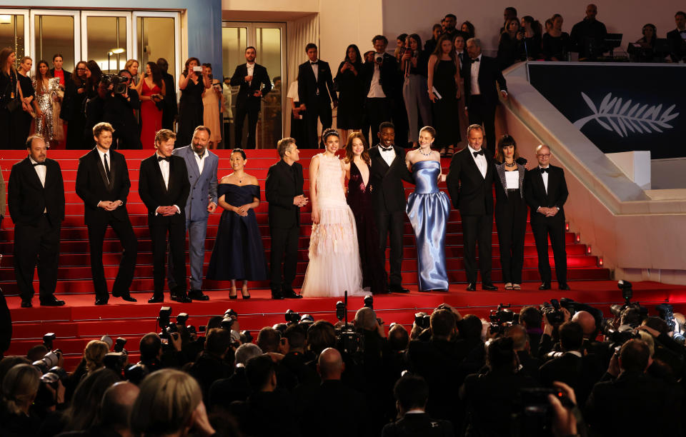 CANNES, FRANCE - MAY 17: (2L to R) Joe Alwyn, Jesse Plemons, Yorgos Lanthimos, Hong Chau, Willem Dafoe, Margaret Qualley, Emma Stone, Mamoudou Athie, Hunter Schafer, Andrew Lowe, Kasia Malipan and Ed Guiney depart the 