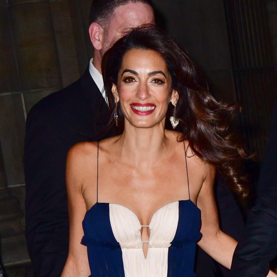 The world’s most famous human rights attorney, Amal Clooney, returned to form in an elegant frock with throwback influences.