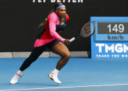 United States' Serena Williams runs to return a shot to Germany's Laura Siegemund during their first round match at the Australian Open tennis championship in Melbourne, Australia, Monday, Feb. 8, 2021.(AP Photo/Rick Rycroft)