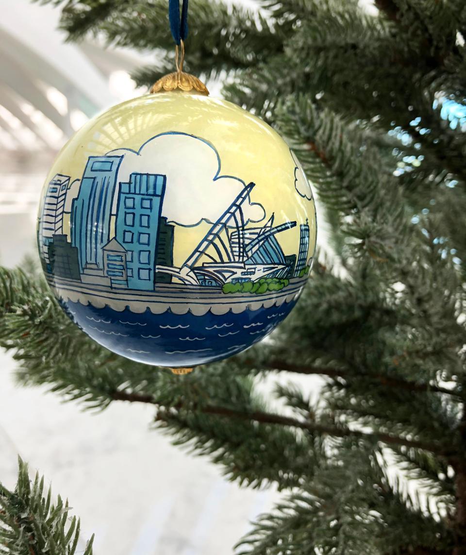 The Milwaukee Art Museum's 2022 Christmas ornament has the city's skyline with a cloudy background.