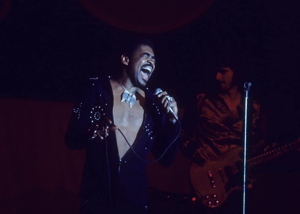 George McCrae performing on stage.