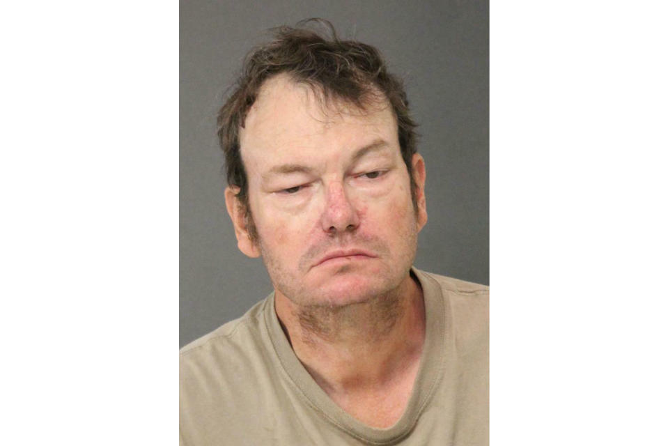 This booking photo released by the Indiana State Police show Bruce Pollard, 57, of Sturgeon, Mo., who was arrested Sunday, July 14, 2019, on preliminary charges including reckless homicide in relation to a fiery, seven-vehicle crash on an Indianapolis freeway, that killed a mother and her 18-month-old twin daughters. (Indiana State Police via AP)