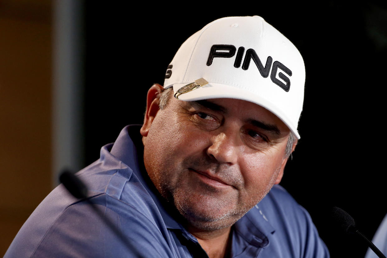 Angel Cabrera, of Argentina, talks at a news conference. 