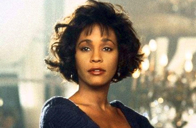 Take a look back at the movies legendary singer, Whitney Houston starred in. Pictured: A cinematic shot of Houston from 