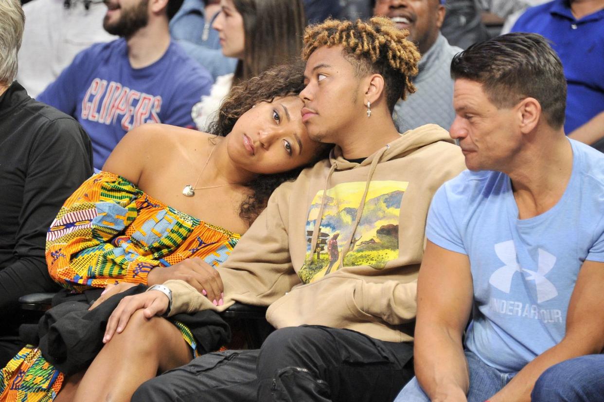 los angeles, california   december 01 naomi osaka and ybn cordae attend a basketball game between the los angeles clippers and the washington wizards at staples center on december 01, 2019 in los angeles, california photo by allen berezovskygetty images