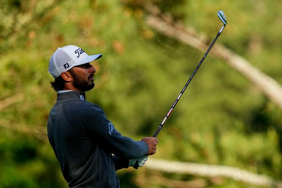 Apr 12, 2024; Augusta, Georgia, USA; Max Homa follows his shot on no. 18 during the completion of the first round of the Masters Tournament. Mandatory Credit: Adam Cairns-USA TODAY Network