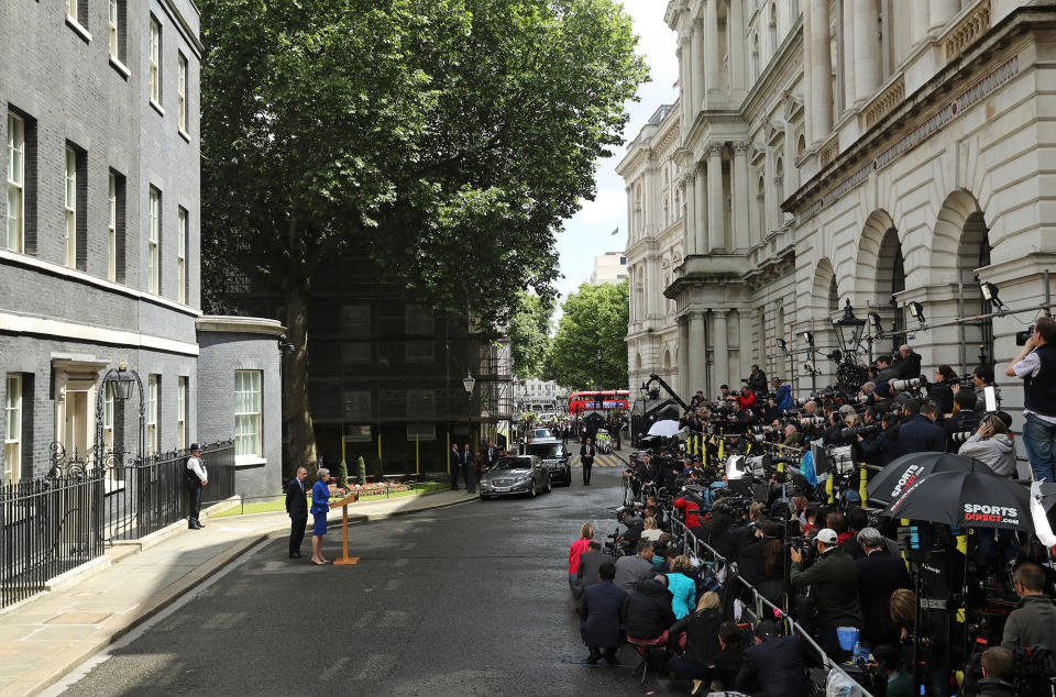 <p>British Prime Minister Theresa May speaks watched by her husband Philip in 10 Downing street, London, as she addresses the press Friday, June 9, 2017 following an audience with Britain’s Queen Elizabeth II at Buckingham Palace where she asked to form a government. (Photo: Tim Ireland/AP) </p>