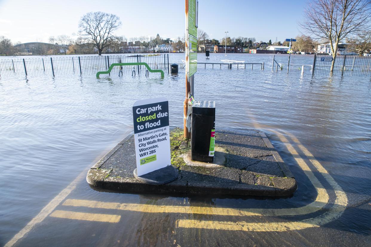 A flooding sign at the flooded Pitchcroft Car Park in Worcester, Worcestershire, where the River Severn continues to rise after several days of heavy rain. Several flood warnings and alerts along the River Severn have been issued.