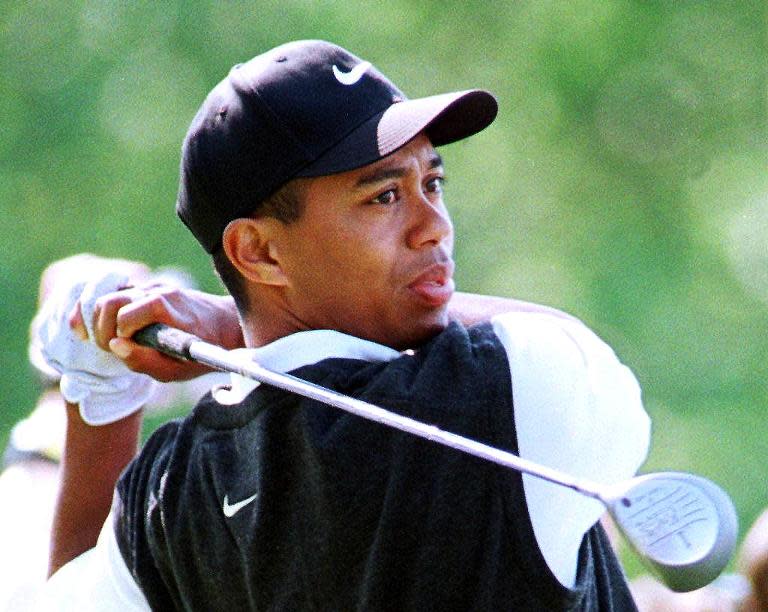 Tiger Woods plays in the final practice round on April 9, 1997 for the Masters golf tournament at the Augusta National Golf Club
