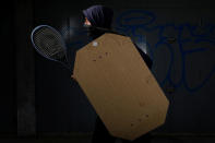 <p>A demonstrator holding a rudimentary shield and a tennis racket poses for a picture before a rally against Venezuelan President Nicolas Maduro’s government in Caracas, Venezuela, May 27, 2017. He said: “I protest for the future of my country.” (Photo: Carlos Garcia Rawlins/Reuters) </p>